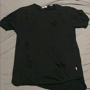 Large black ripped tee.